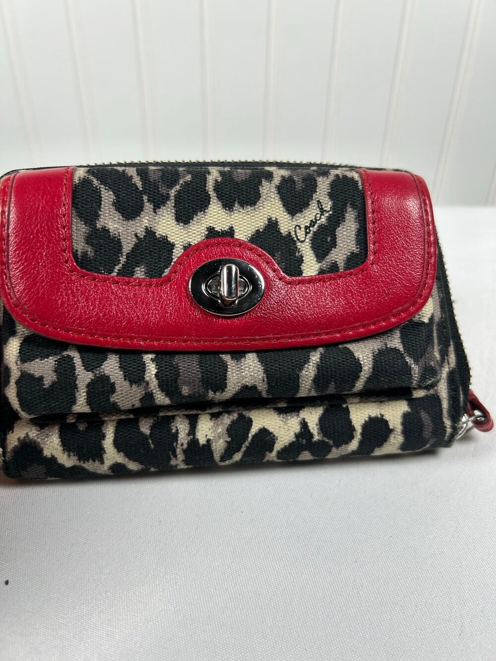 COACH PARK OCELOT PRINT W/RED TRIM SLIM ENVELOPE BI-FOLD WALLET